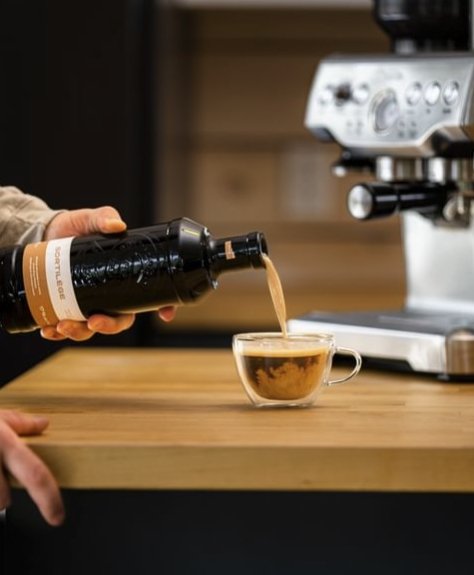 Sortilege cream liqueur being poured into a glass. Sortilege canadian maple liqueur