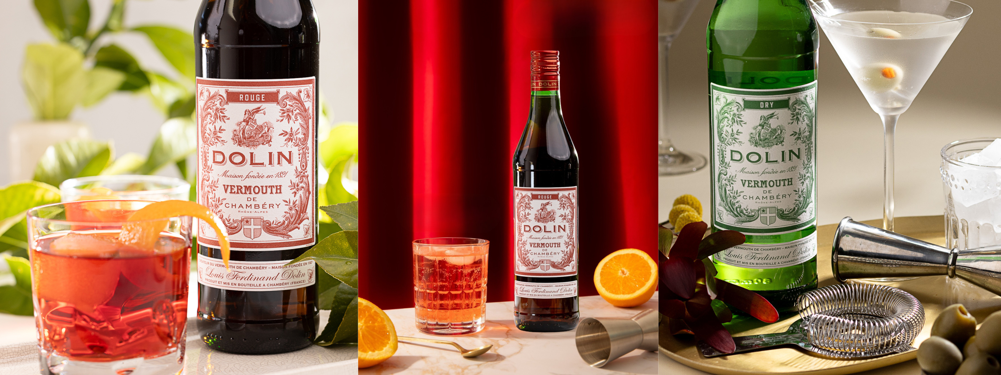 An image containing three bottles - two of dolin rougue, one of dolin dry. Alongside them are various cocktails - negronis and martinis - as well as cocktail making tools like strainers.